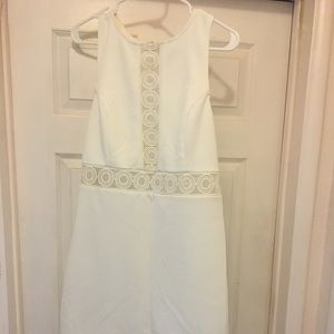 White dress with eyelet cutouts